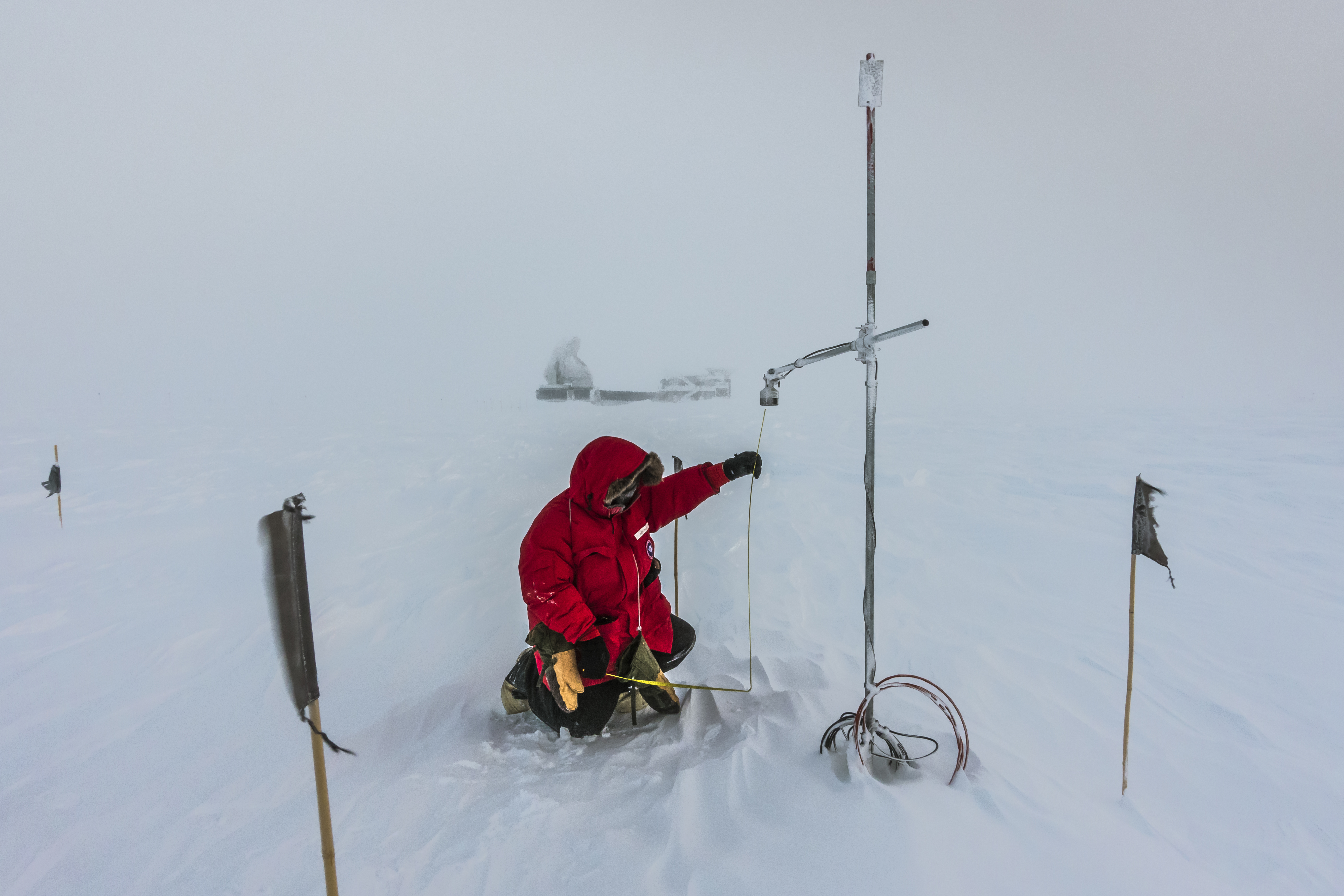 Taking snow measurements at the South Pole.